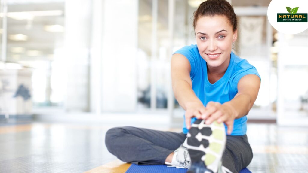 A woman stretches on a mat, embodying holistic health and well-being.