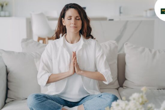 A lady doing yoga for reducing stress