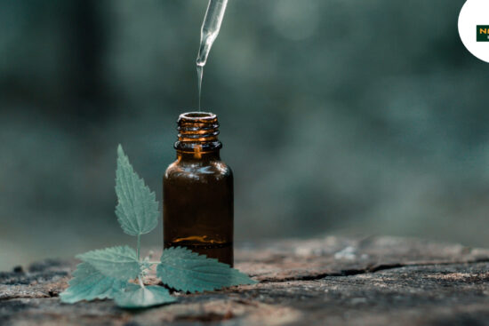 essential oils labeled for skin care, showcasing Nature’s Medicine Cabinet products in elegant bottles.