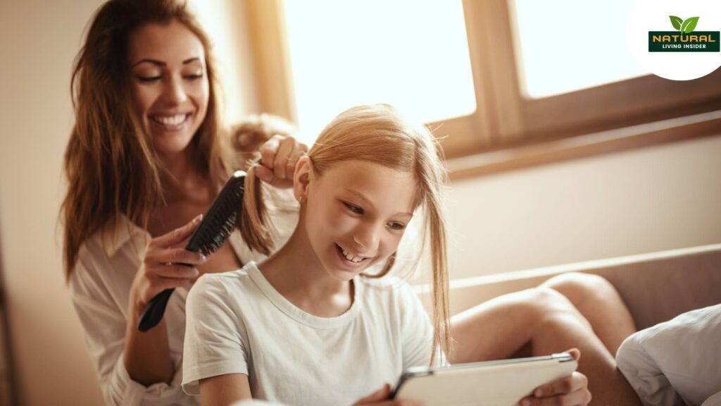 Woman and child explore chemical-free hair care on a tablet.