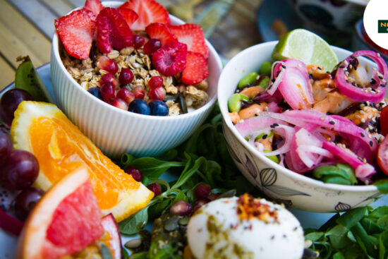 A colorful plate of fresh fruits and veggies, bursting with natural textures.