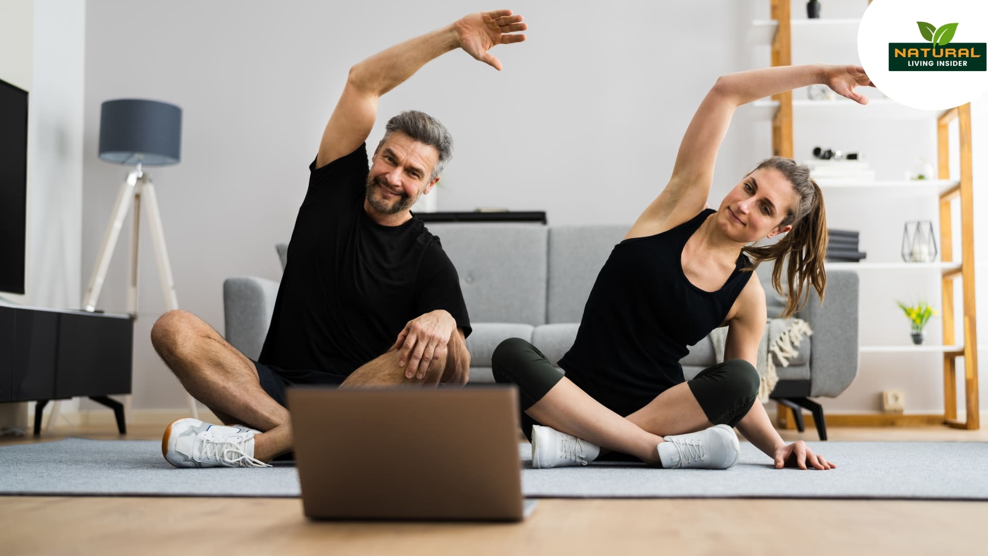 A man and woman practicing exercise together via a laptop, showcasing fitness tips and wellness insights.