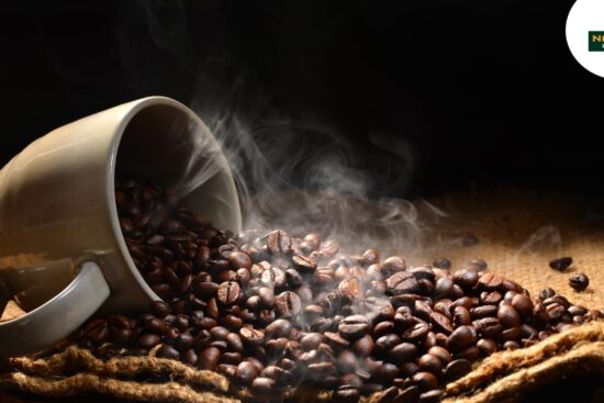 Steaming coffee beans, highlighting coffee’s health benefits for a refreshing start.